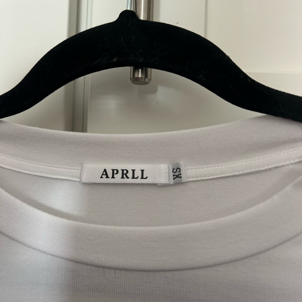 APRLL XS white, silky, long-sleeved, stretchy top